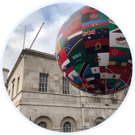 Inflatable globe with the worlds country flags on it